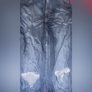 Dark wash distressed jeans… distressed knees